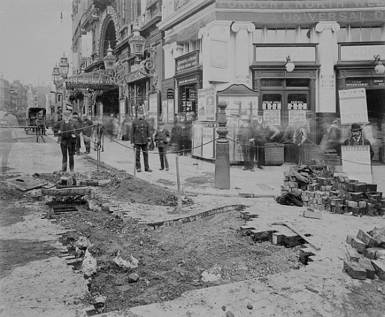 Removing the cobblestones outside the Criterion Theatre od English Photographer