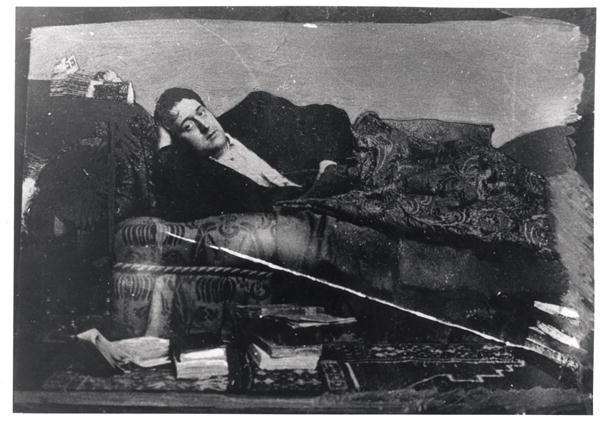 Portrait of Guillaume Apollinaire (1880-1918) reclining, c.1910 (b/w photo)  od French Photographer