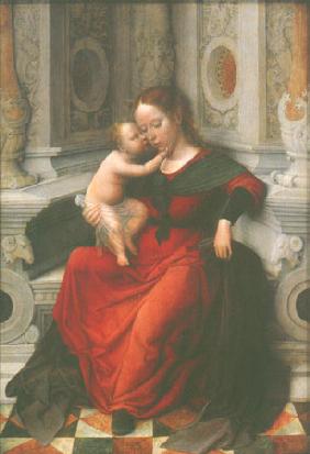 Madonna with child in a niche sitting enthroned