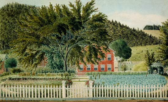 View of a Red House with a Picket Fence od American School