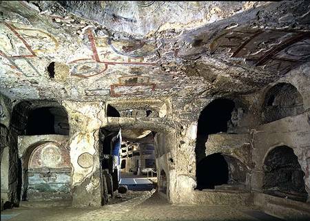 Interior of a catacomb chamber cut from tufa stone showing fragments of frescoed decoration od Anonymous