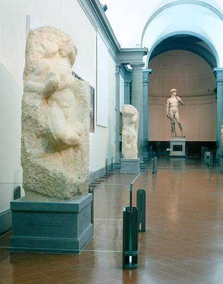 Interior view of the gallery with Michelangelo's 'Awakening Slave' and 'David' in the background (ph od Anonymous
