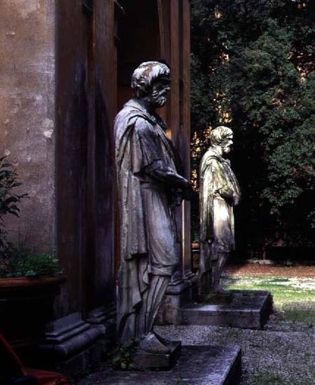 The main entrancedetail of two statues of prisoners on guard od Anonymous