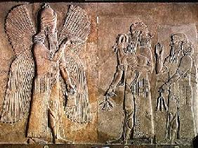 Frieze depicting a winged spirit, a sargon or priest carrying a gazelle and a worshipper carrying a
