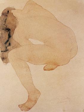 Seated nude bending over