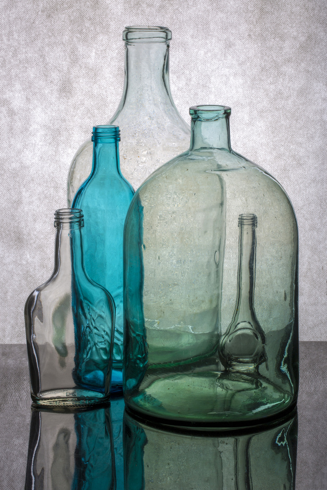 Still life with different transparent glass bottles od Brig Barkow