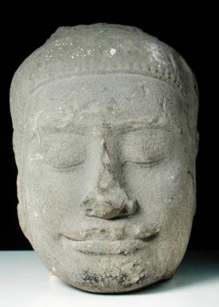 Buddha head with closed eyes, Angkor od Cambodian