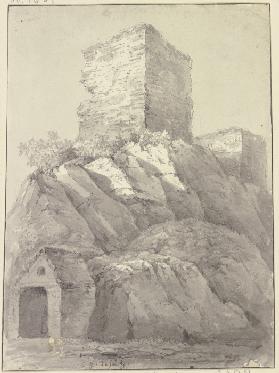 Zwei Burgtürme auf einem Felsen, im Vordergrund ein Steinhäuschen