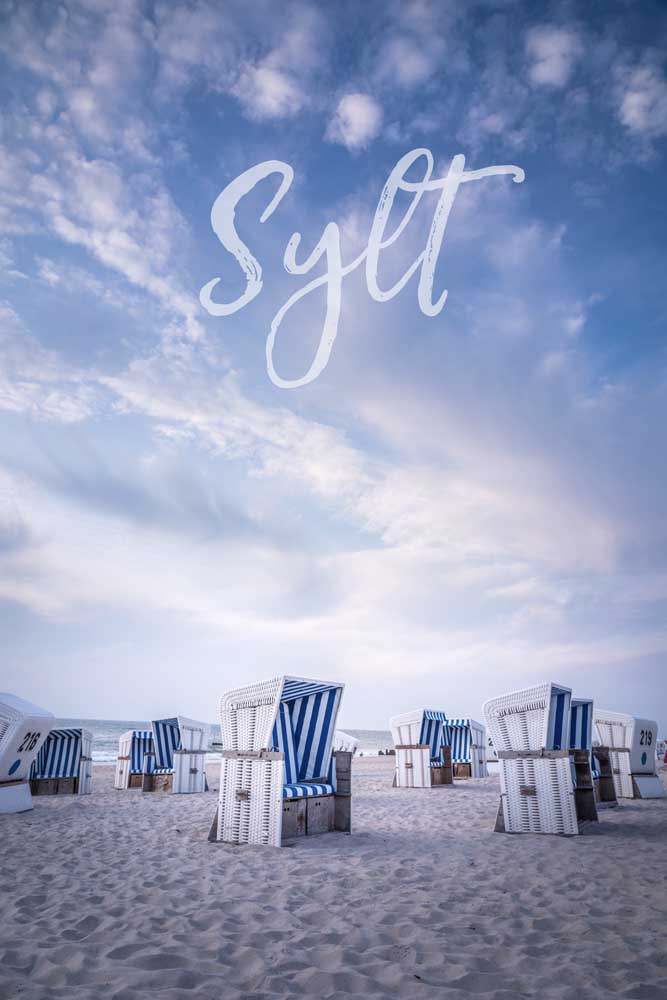 Summer evening with beach chairs with the lettering Sylt od Christian Müringer