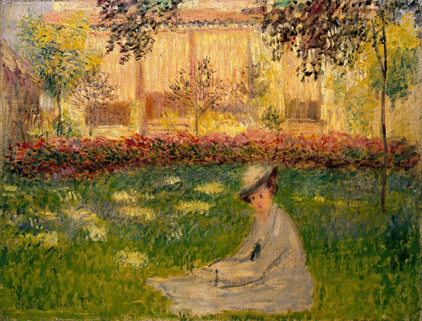 Woman in a Garden od Claude Monet
