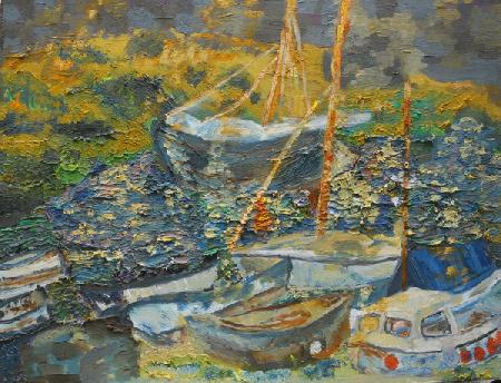 Mousehole harbour, resting boats