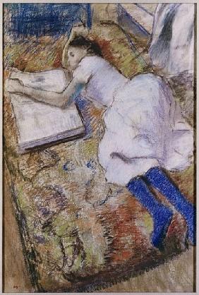 Young Girl Stretched Out Looking at an Album, c.1889