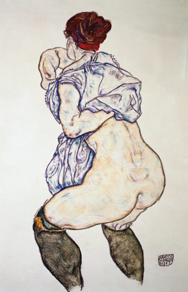 Female half act with green stockings od Egon Schiele