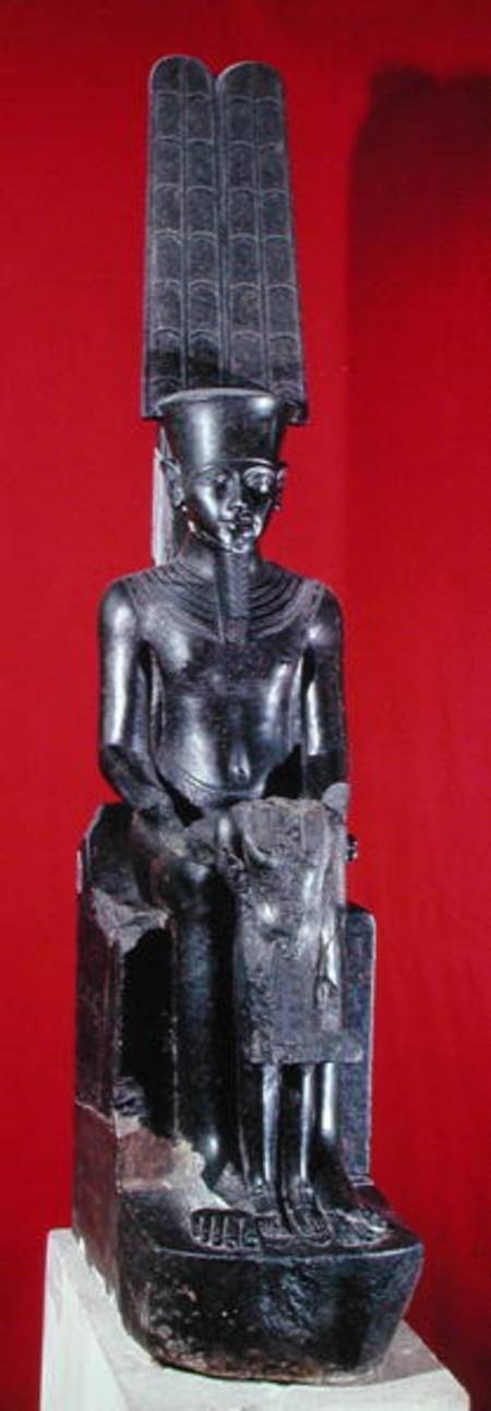 Seated statue of the god Amon protecting Tutankhamun, New Kingdom od Egyptian