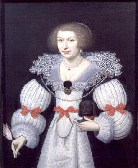 Portrait of a lady holding a dog and a tulip