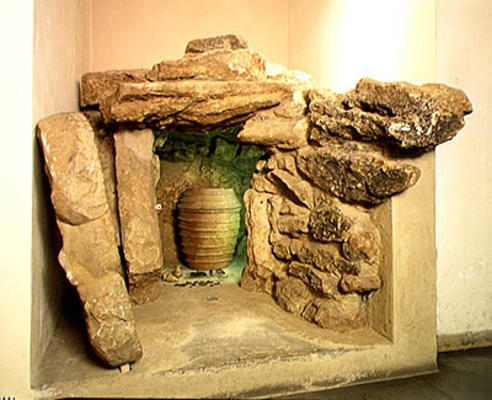 Reconstruction of an Etruscan tomb with an urn (stone) od Etruscan