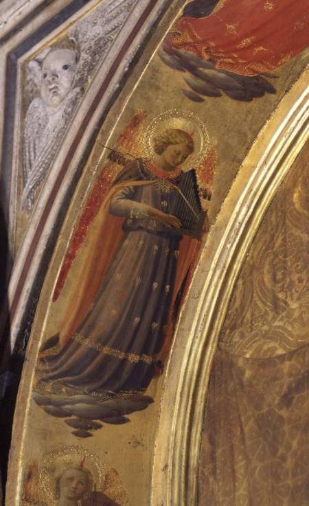 Detail from the side of the Linaivoli Triptych showing an angel holding a portative organ od Fra Beato Angelico