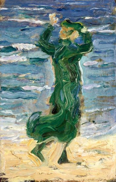 Woman in the wind by the sea
