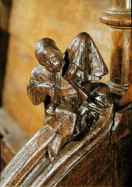 Musician playing a double flute, detail from a choir stall od French School