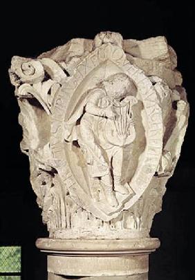 Capital depicting the Third Key of Plainsong with a lute player