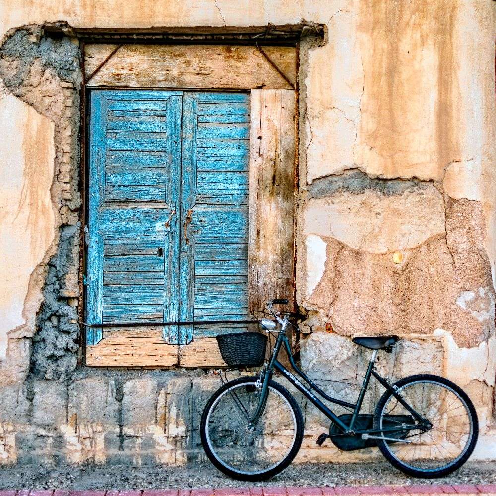 Old Window and Bicycle od George Digalakis