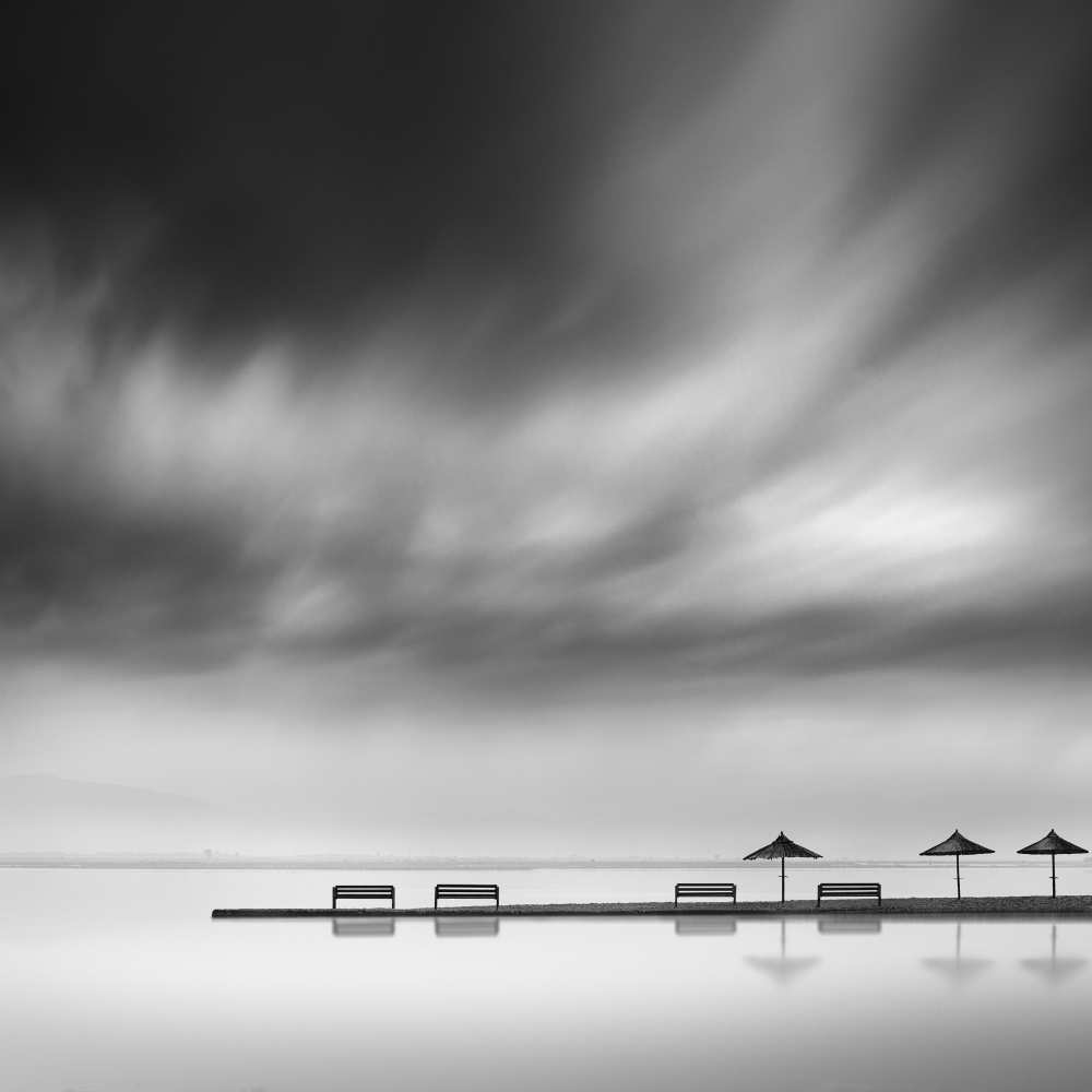 Four Benches and three umbrellas od George Digalakis