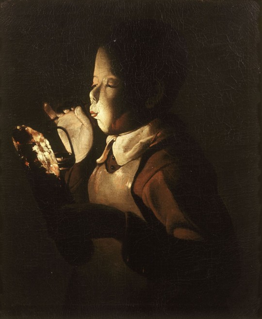 Boy Blowing at Lamp od Georges de La Tour