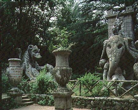 One of Hannibal's elephants and a dragon fighting with a lion, sculptures from the Parco dei Mostri od Giacomo Barozzi da Vignola