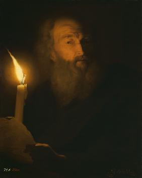 Portrait of a bearded man in the candlelight