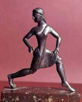 Figurine of a girl running