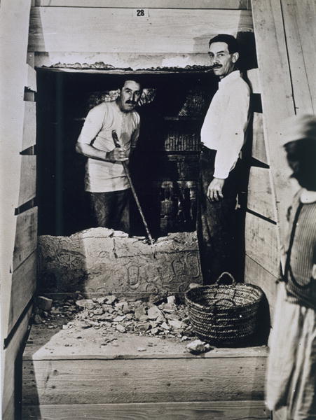 Howard Carter (1873-1939) and a colleague standing beside a partially demolished wall to one of the  od Harry Burton