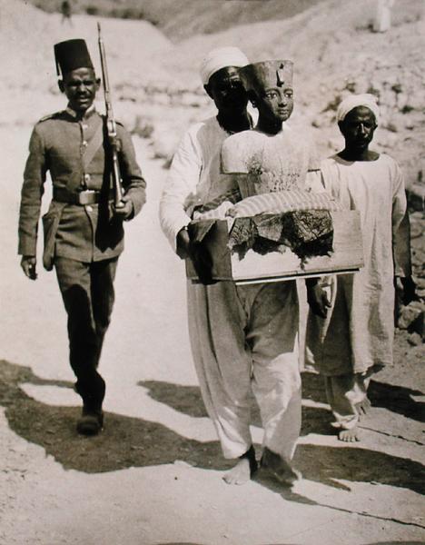 The mannequin or bust of Tutankhamun being carried from the tomb, Valley of the Kings, 1922 (gelatin od Harry Burton