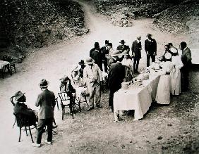 Distinguished visitors taking refreshments near the Tomb of Tutankhamun at the opening of the inner 