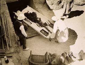 Funeral bouquet being removed from the Tomb of Tutankhamun, Valley of the Kings, 1922 (gelatin silve