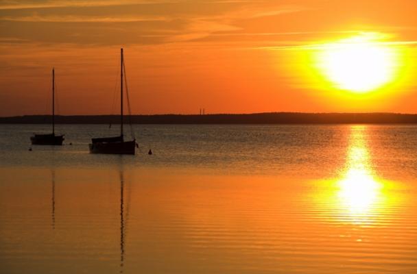 Segelboote im Sonnenuntergang od Holger Schmidt