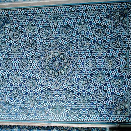 North portal tile panel, one of a pair with protruding palmettes and stars encircling the central su od Islamic School