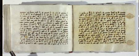 Two pages of a Koran manuscript written in Oriental Kufic script od Islamic School