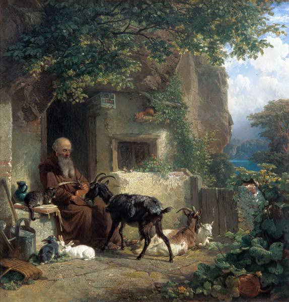 An Eremit in front of his hermitage, a goat feeding.