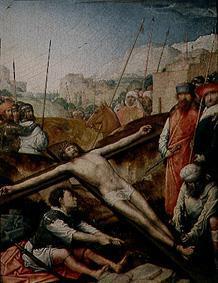 Christ is nailed onto the cross.