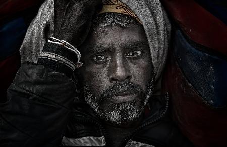Indian man at the Kumbh Mela - Prayagraj - India