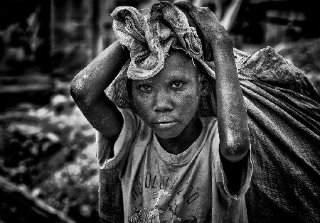 Child working on construction in the streets of Juba - South Sudan