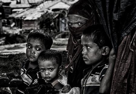 Rohingya refugee family in a rickshaw - Bangladesh