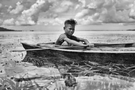 Boy in a Canoe