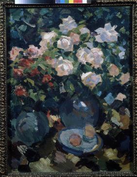 Roses in a blue jug