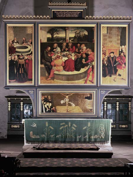 Altar with a Triptych depicting: left panel, Philipp Melanchthon (1497-1560) performing a baptism as od Lucas Cranach d. Ä.
