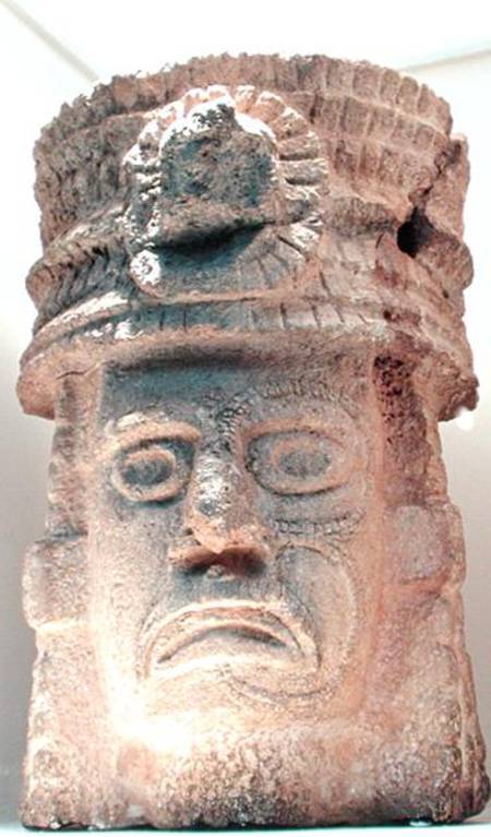 Figure wearing a feathered hat od Mayan
