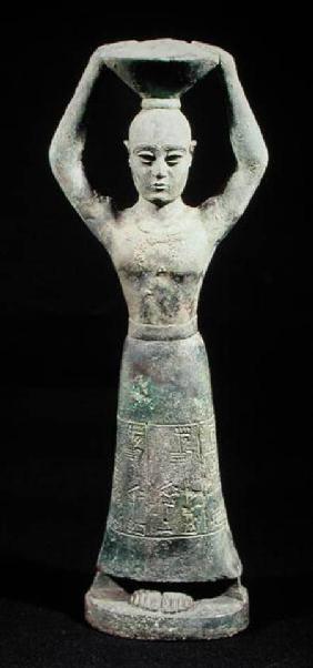 Statuette of an offering bearer with a votive inscription, from Uruk, Protoliterate Period