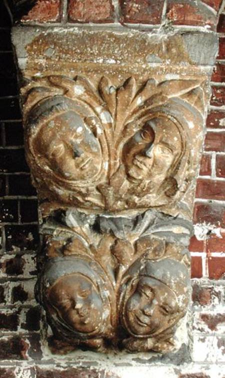 Carved capital depicting four faces, from the south portal od Netherlandish School
