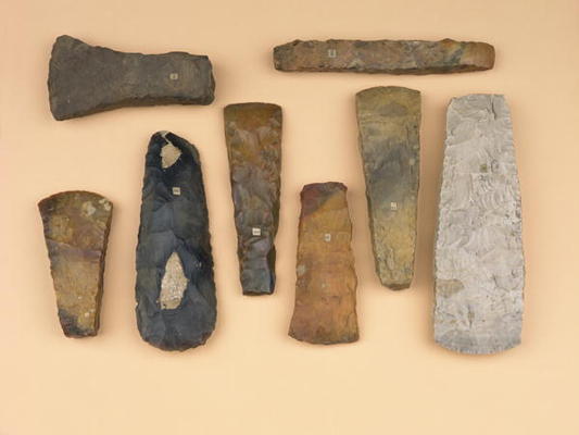 Collection of Neolithic to early Bronze Age weapon heads including Scandinavian stone battle and Dan od 