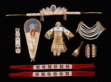 A Collection Of Objects Including Plains Beaded Necktie,  Model Cradleboard, Doll And Neck Ornament od 
